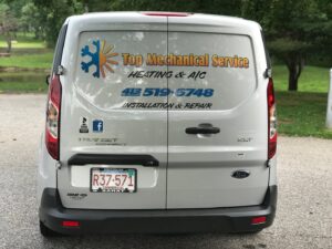 Rear view of a branded HVAC service van for Top Mechanical Service, ready for service calls in East Longmeadow, MA.