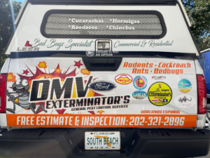 Rear view of a branded pest control truck for El Exterminador Del DMV in Rockville, MD, listing services like rodents and bedbugs.