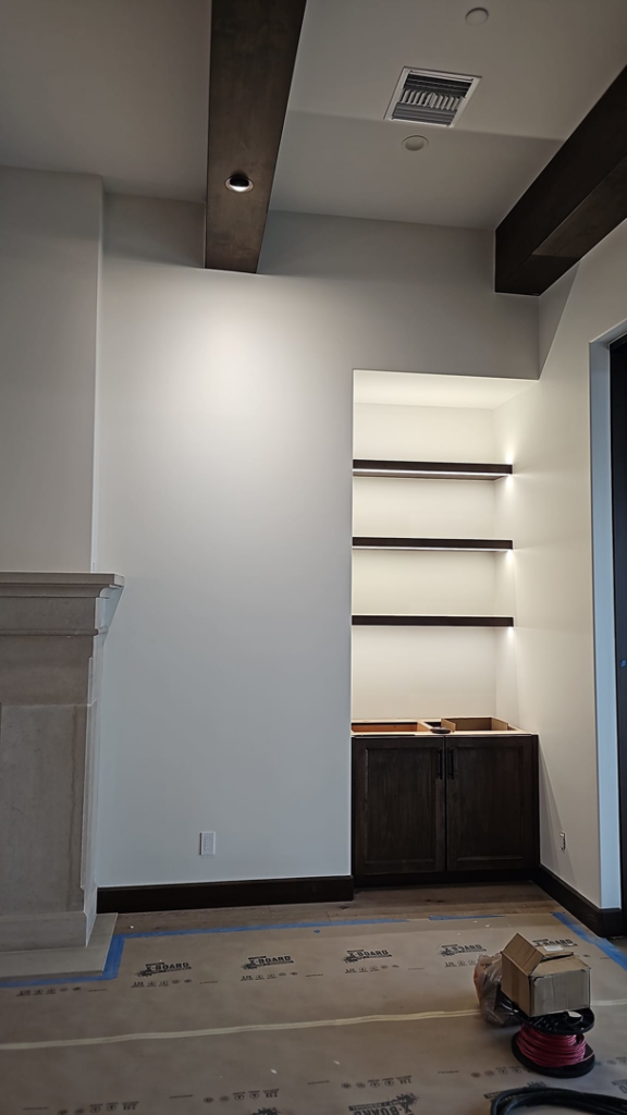 Recessed ceiling lights and LED shelf lighting installed in a living space by JGM Electric INC. in Glendale, AZ