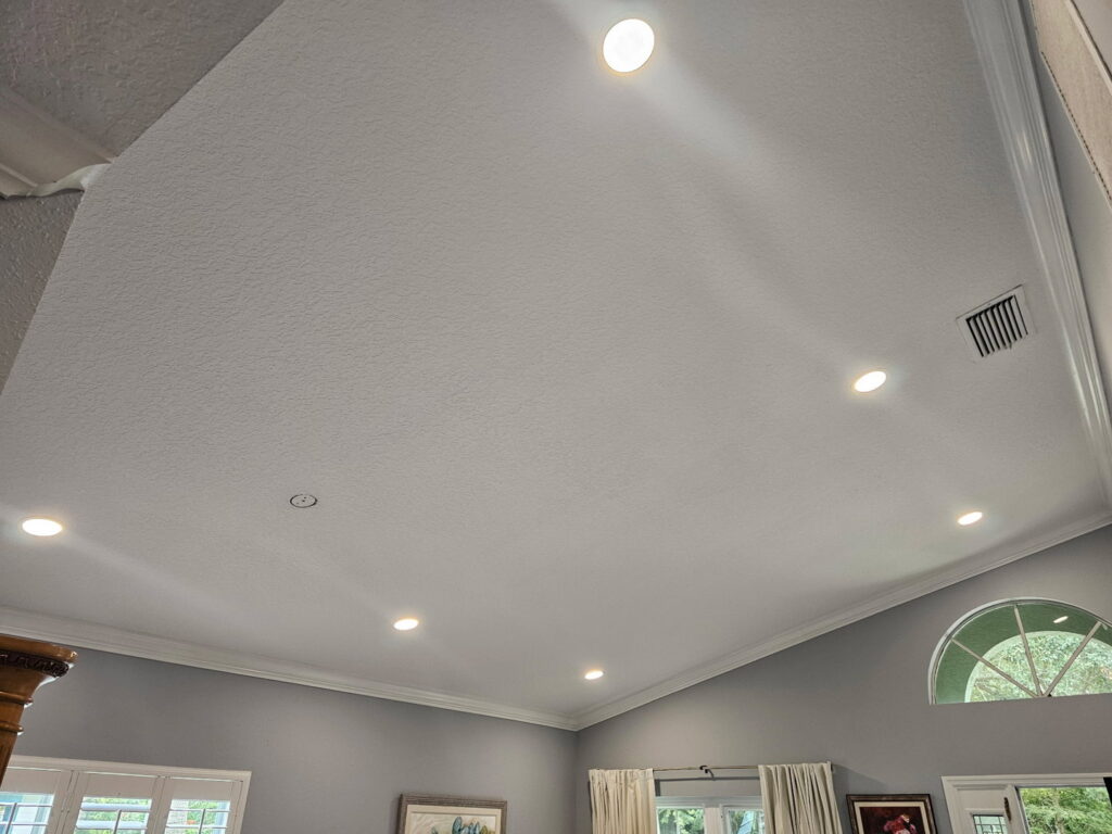 A ceiling with newly installed recessed lighting fixtures by Everyday Electric in Tampa, FL.