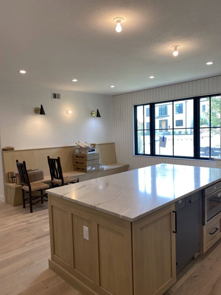 Interior room featuring new recessed lighting and wall sconces installed by All Electric llc in Denver, CO