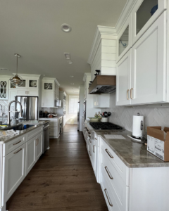 Modern kitchen featuring professionally installed recessed lighting by Anchor Electric LLC in Wilmington, NC