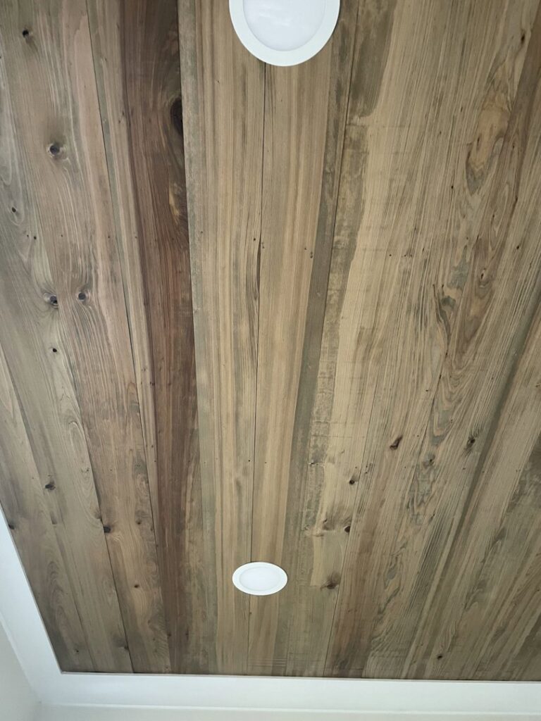 Newly installed recessed lighting fixtures in a wooden ceiling by Greater Baton Rouge Electric in Baton Rouge, LA.