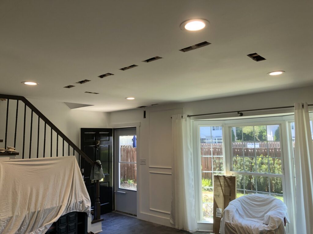 Recessed lighting installation in progress with some lights on, by McCall Enterprises in Atlanta, GA.