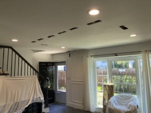 Recessed lighting installation in progress with some lights on, by McCall Enterprises in Atlanta, GA.