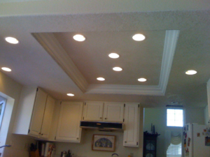 A kitchen ceiling with newly installed recessed lighting by Jack-O-Lantern Electric in Knoxville, TN.