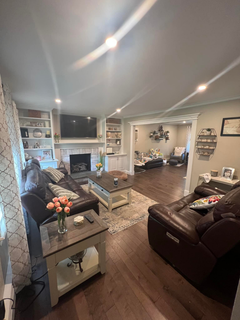 Modern recessed lighting installed in a comfortable living room by TD Electric in Waterbury, CT, providing bright illumination.