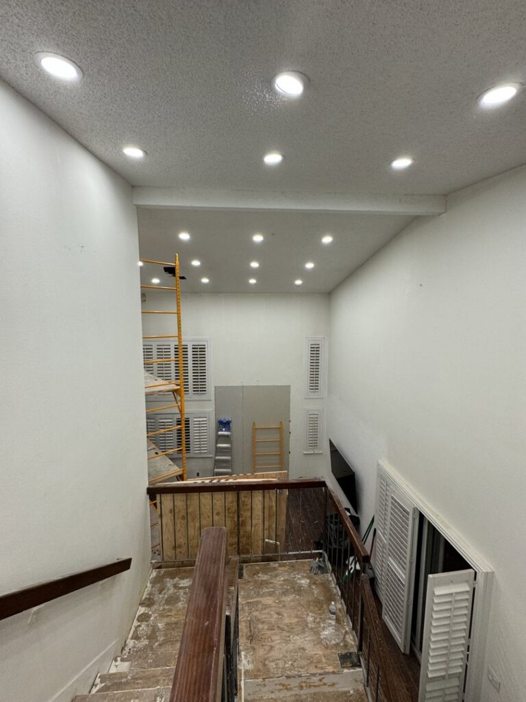 Recessed lighting installation in a room under renovation by Positive Electricians in Van Nuys, CA.
