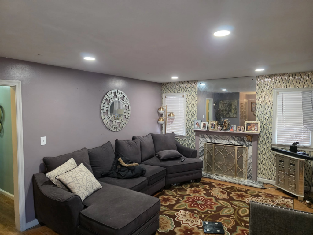 Bright recessed lighting installed in a living room by J Turner Electric LLC in Indianapolis, IN.