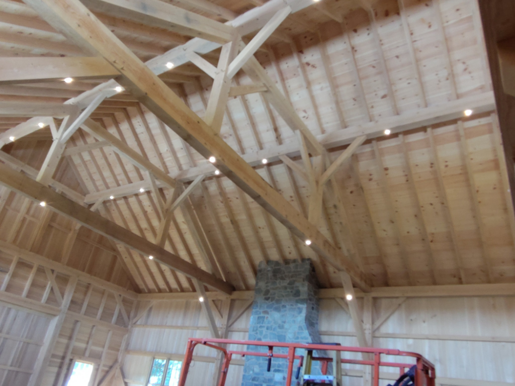 An ongoing project showing recessed lighting installed in a high wooden ceiling by Ryco Electric in York, PA