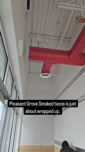 Red exposed ductwork installed in a taco shop by Big Leaf Mechanical LLC, an HVAC contractor in South Salt Lake, UT.