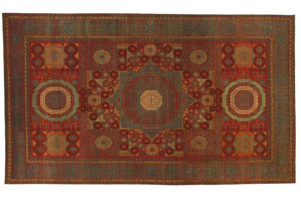 A beautiful red and green traditional carpet, part of the exquisite collection at Woven Legends in Philadelphia, PA.