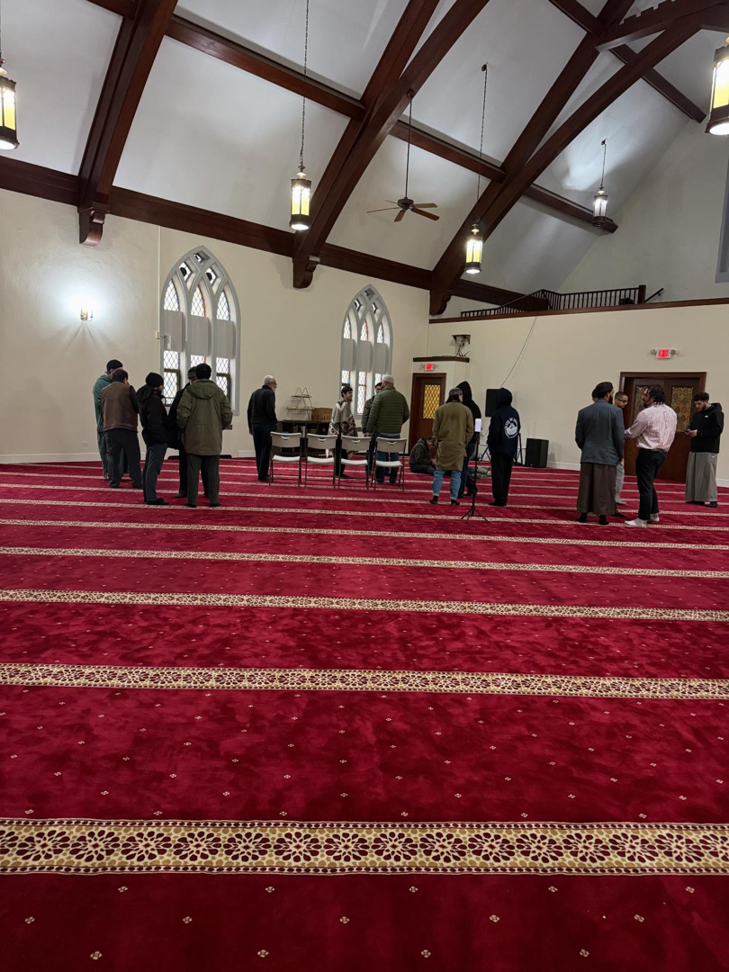 A vibrant red patterned masjid carpet expertly installed by Musalla Masjid Carpets in Glendale Heights, IL.