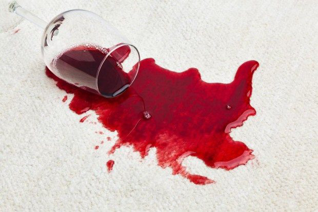 Red wine spilled on white carpet, for Pro-line Professional Upholstery & Carpet Cleaning, Austin, TX.