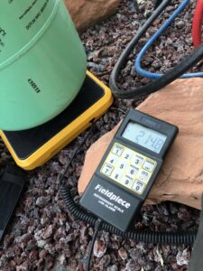 A refrigerant scale with a tank and gauges, used for HVAC service by Peterson Heating & Cooling in Mound City, KS.