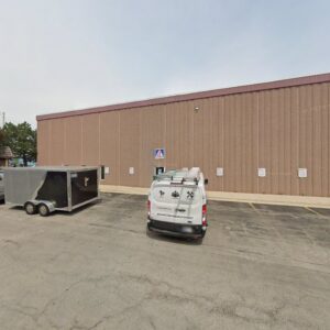 A refrigeration HVAC contractor van and trailer parked outside Johnstone Supply - Naperville, IL