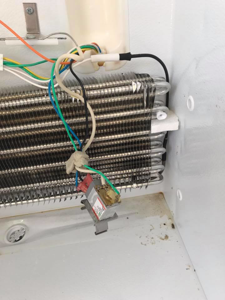 Electrical repair inside a refrigeration unit by Southern Electrical Services in Houma, LA