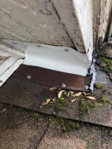 Repaired roof corner with new flashing installed for wildlife exclusion by Evictus Wildlife Solutions in South Bend, IN.