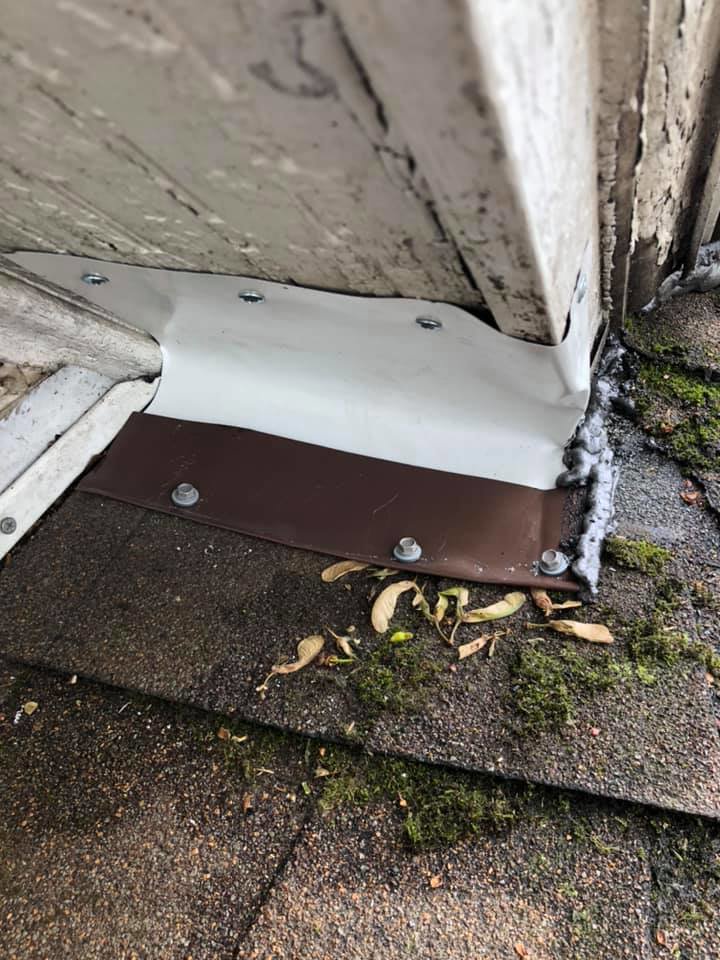 Repaired roof corner with new flashing installed for wildlife exclusion by Evictus Wildlife Solutions in South Bend, IN.