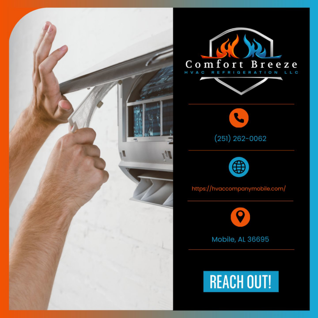 Hands replacing a filter in an indoor mini-split AC unit by Comfort Breeze HVAC Refrigeration in Mobile, AL.