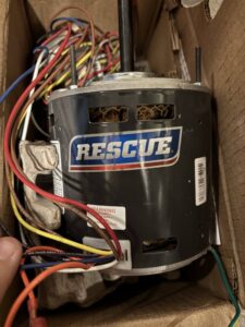A new Rescue brand HVAC blower motor, a component for heating and cooling systems by Reliable Heating & Cooling LLC, Colorado Springs, CO