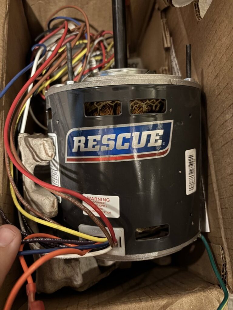 A new Rescue brand HVAC blower motor, a component for heating and cooling systems by Reliable Heating & Cooling LLC, Colorado Springs, CO