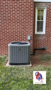 An outdoor residential air conditioning condenser unit installed by GT Mechanical Services in Baltimore, MD