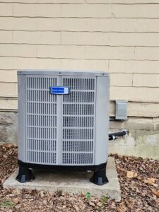 A newly installed residential air conditioning condenser unit by Xtreme Heating & Cooling in Tulsa, OK