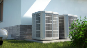 Two residential air conditioning condenser units installed next to a house by Reed's Heating & Cooling in Toms River, NJ.