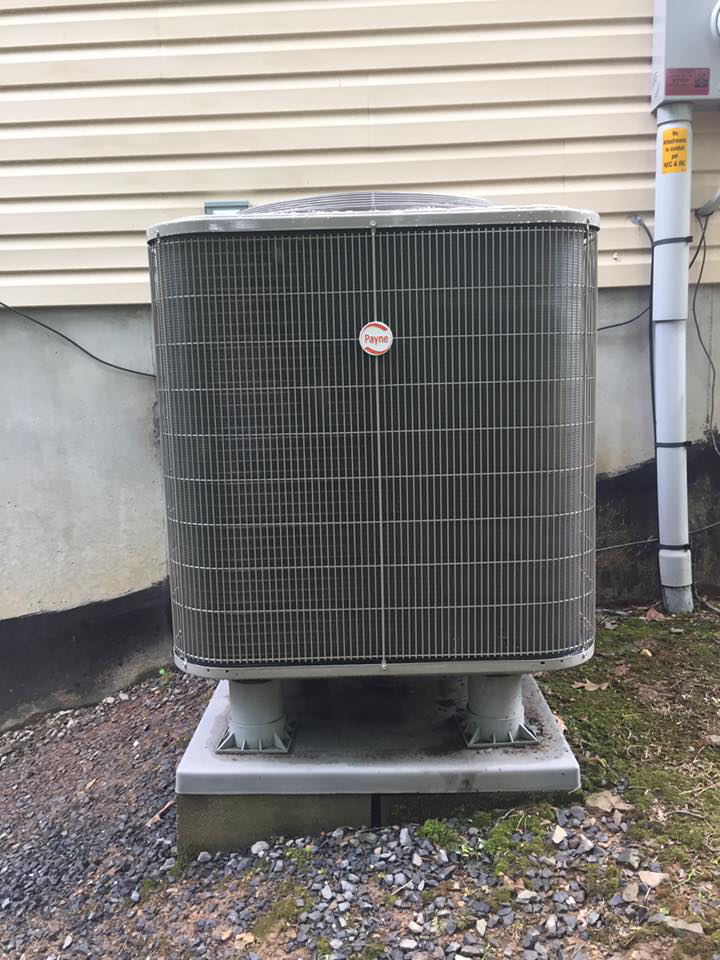 A residential outdoor air conditioning unit maintained by Hitz Heating Inc. in Harrisburg, PA.
