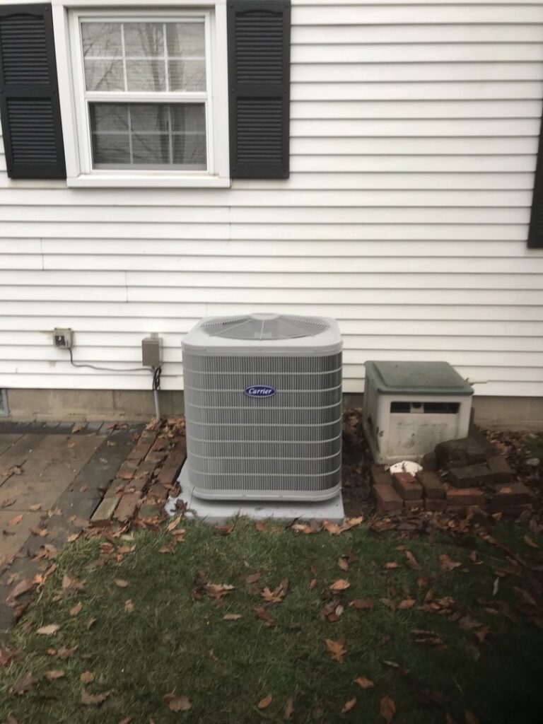 A residential outdoor air conditioning unit installed by Chad Byers - Edge Guys Heating & Cooling in Carmel, IN.