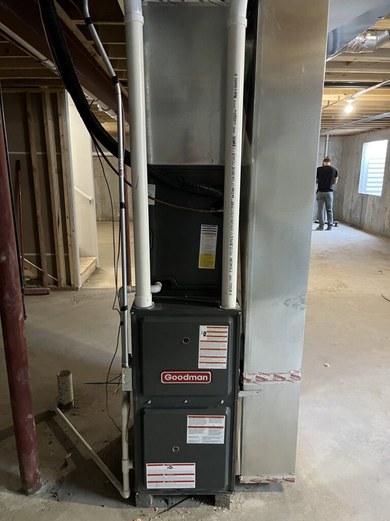 A residential air conditioning unit installation by DJ's Heating & Air Conditioning in Wilmington, IL.