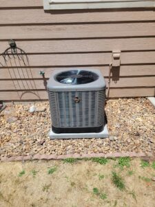 A newly installed residential AC unit by Kraemer Mechanical in Broomfield, CO.