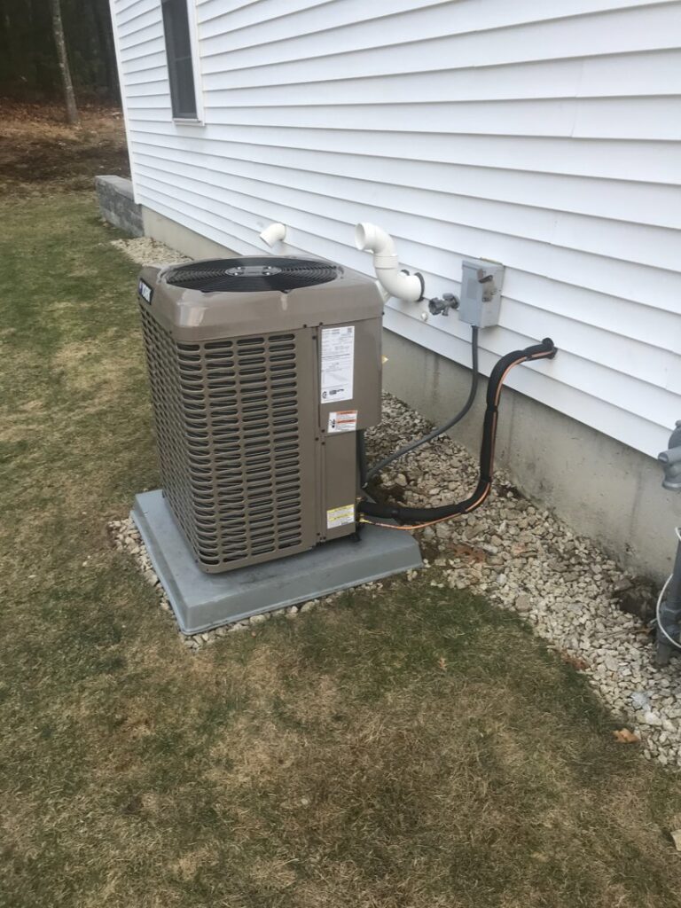 A residential outdoor air conditioning unit installed by Quality Comfort Inc. in Aston, PA
