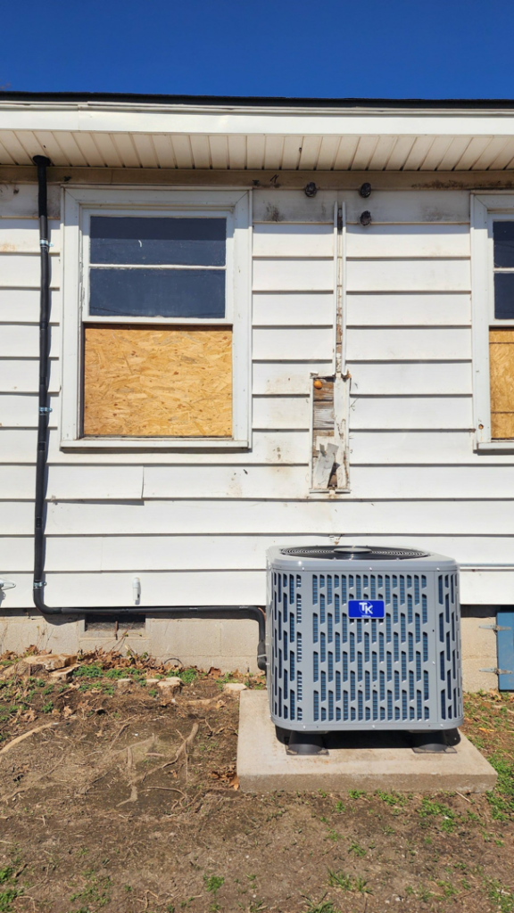 An outdoor residential air conditioning unit installed by Xtreme Heating & Cooling in Tulsa, OK