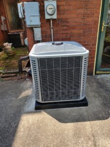A residential outdoor air conditioning unit installed by Bouvy Heating & Air Conditioning Services in Pittsburgh, PA.
