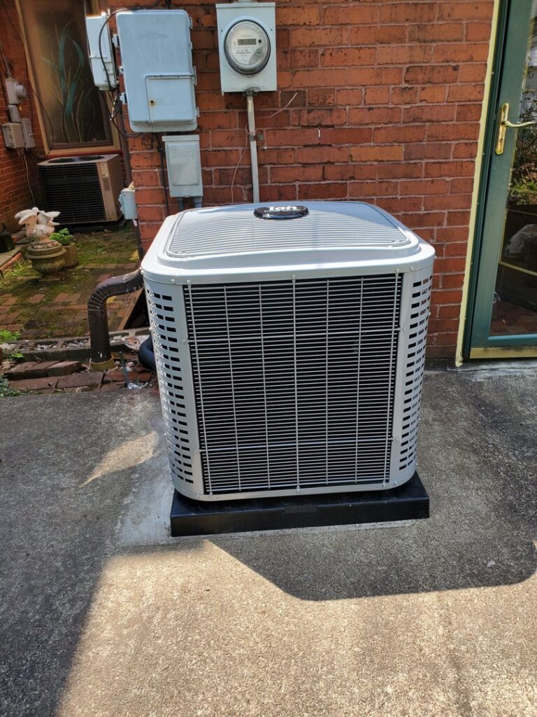 A residential outdoor air conditioning unit installed by Bouvy Heating & Air Conditioning Services in Pittsburgh, PA.