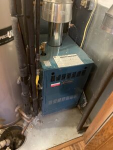 A residential boiler or furnace unit in a utility space, maintained by Service Experts Denver in Westminster, CO