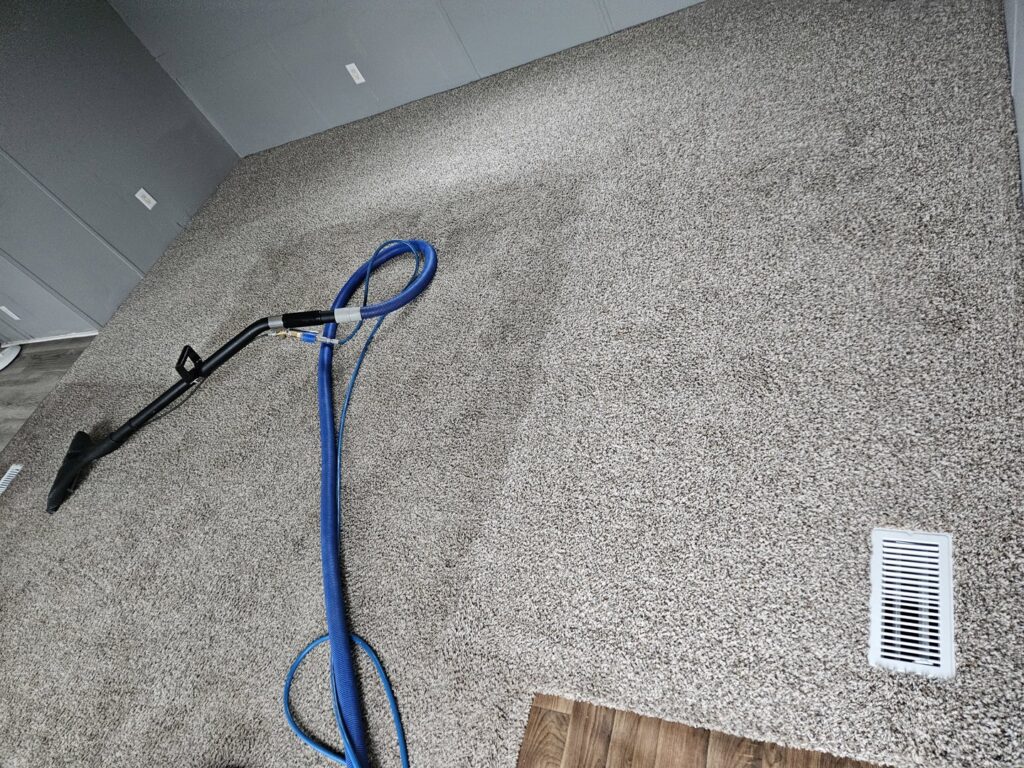 Residential carpet cleaning in a living room by Andy's Cleaning Company LLC in Topeka, KS.