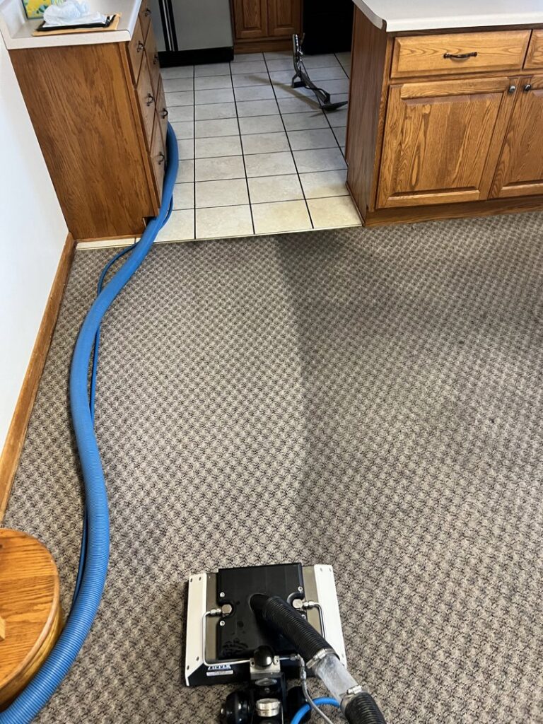 Residential carpet cleaning in progress, showing before and after results by Yellow Van Cleaning & Restoration in Kearney, NE