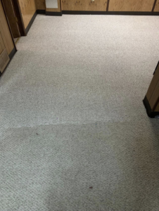 A residential room with light-colored carpet showing the clear results of a professional cleaning service by Capital City Floor Care LLC in Columbus, OH.
