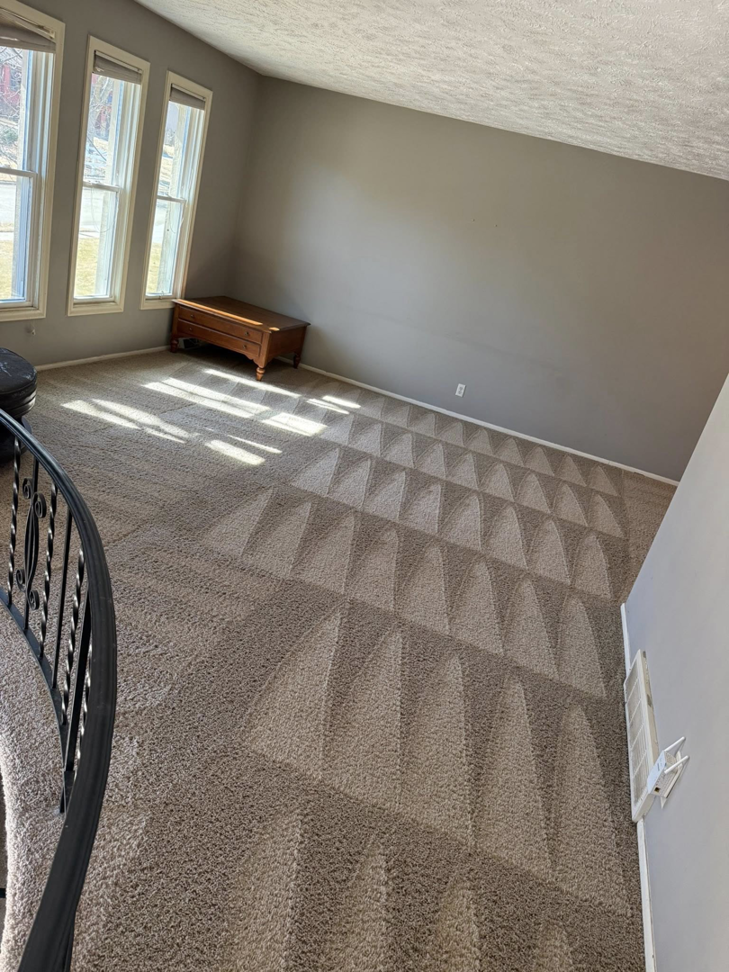 Residential carpet cleaning service showing fresh vacuum lines by Midwest Carpet Rescue in Omaha, NE.