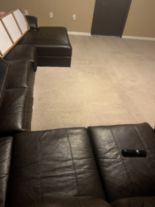 A clean carpet in a residential living room after professional cleaning by Strategic Carpet Clean in Winter Park, Orlando, FL