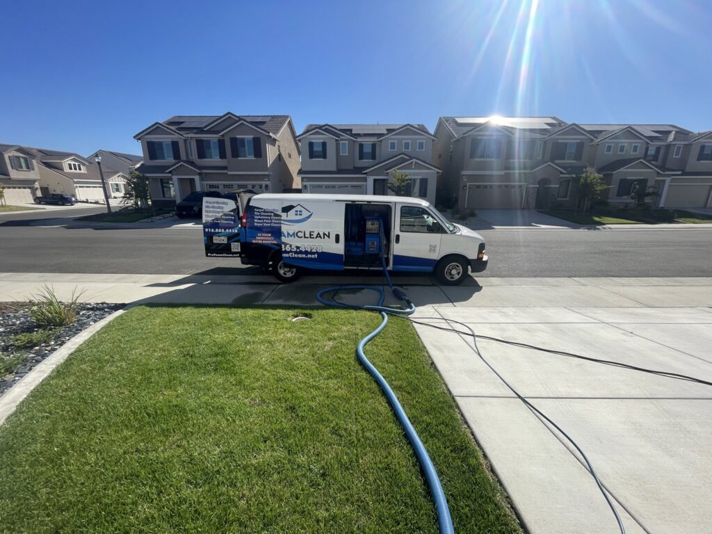 Pro Team Carpet Cleaning Sacramento, CA van parked on a residential street with hoses ready for a cleaning job.