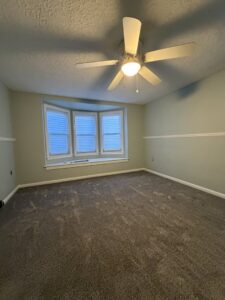 Residential gray carpet installation completed by Flooring World Wide LLC in Plainwell, MI.