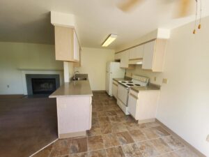 A view of a residential living room with new carpet installation by Pg Long Floorcovering LLC in Portland, OR.