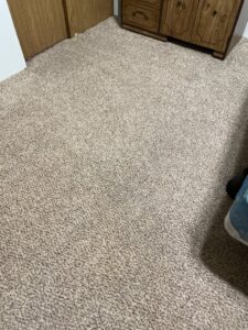 Residential carpet with visible stains, indicating a need for professional cleaning from Clean-Master in Coeur d'Alene, ID.