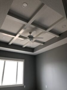 A newly installed ceiling fan and recessed lights in a residential room by Sterling Electric in Fort Wayne, IN.