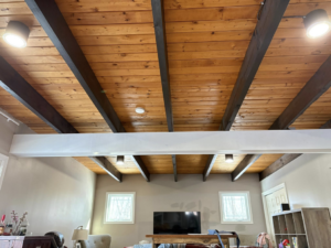 Multiple modern ceiling lights illuminating a residential room, installed by East West Electric LLC in Chester, NH.