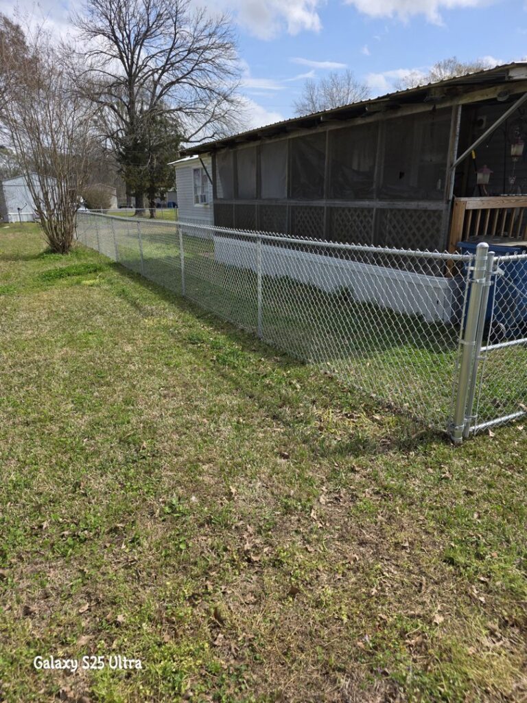 A residential chain-link fence installation by Lynch's Temporary Fencing & Dumpster rental in Bossier City, LA.